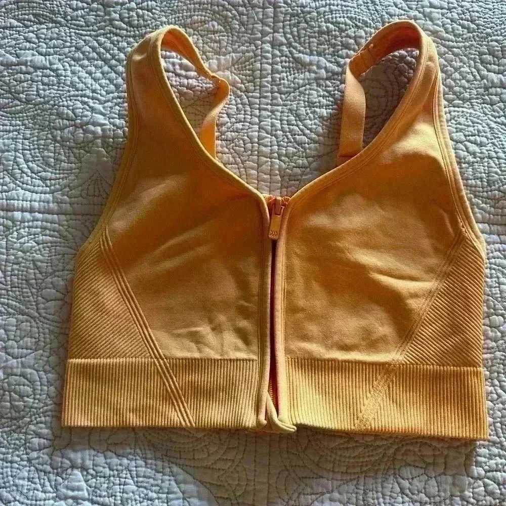 Yellow Orange zip up woman’s sports bra size small. Soft colorful & comfortable